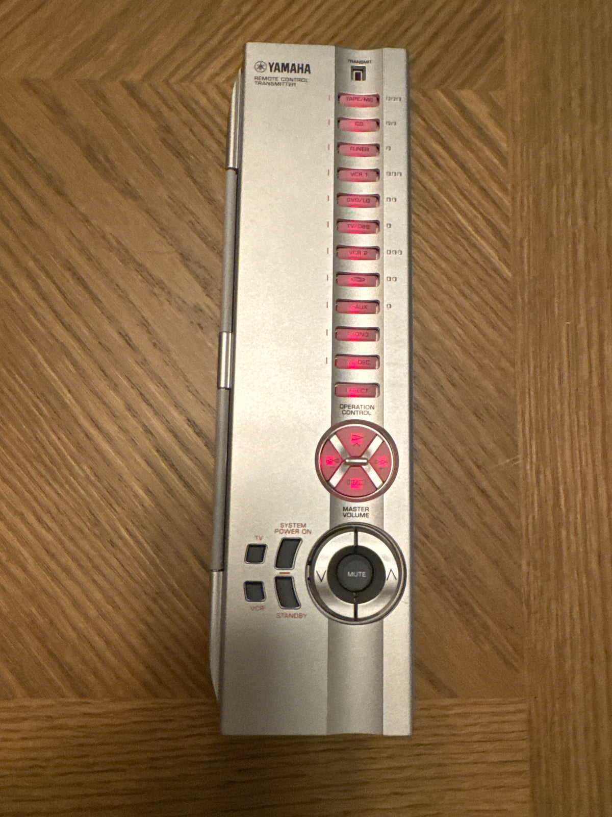 Yamaha RAV180 OEM Learning Remote Control V296670 — Illuminated, Mint — front view